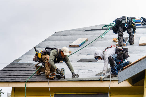 Professional Gutter Installation technician working in Blue Rock, OH
